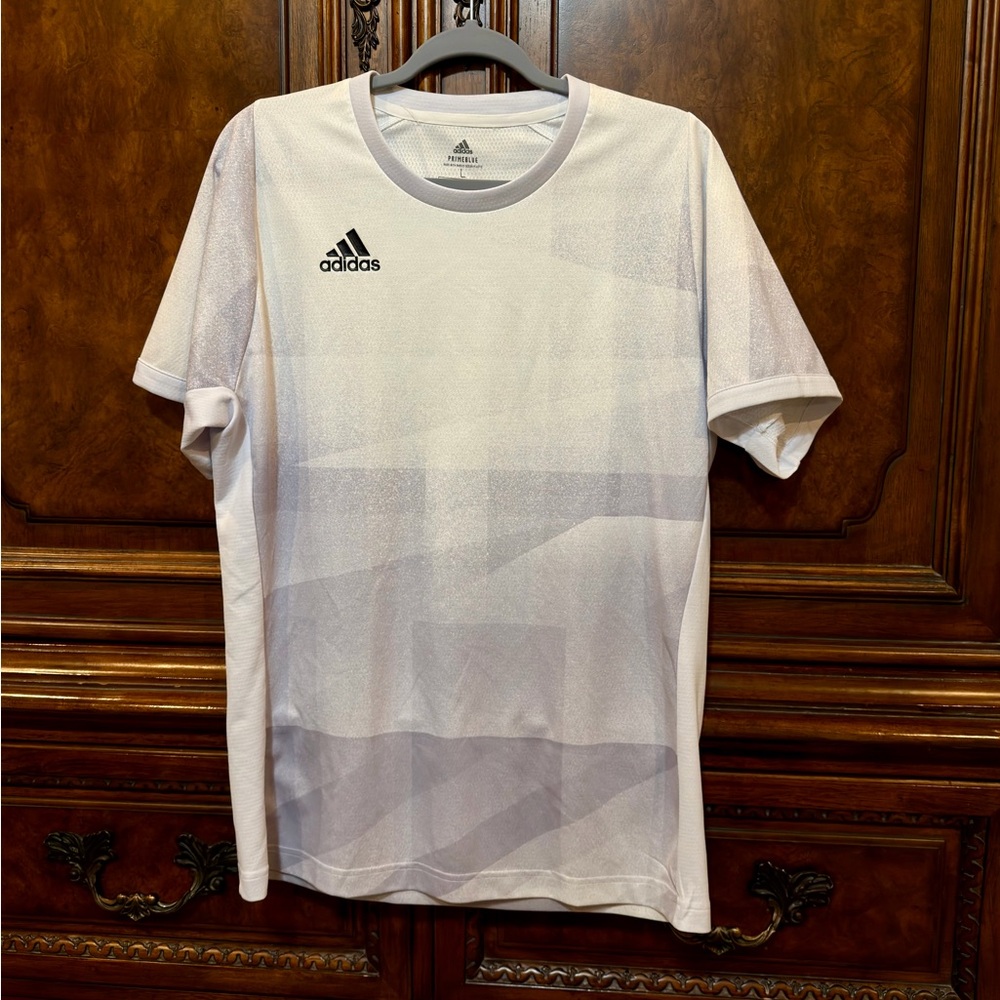 Adidas Men’s L Prime Blue White Short Sleeve Tennis Tee with Light Gray Pattern.
